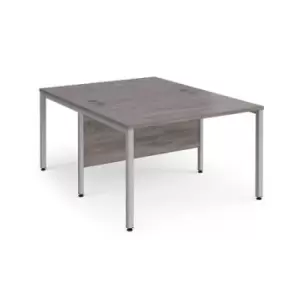 Image of Maestro 25 back to back straight desks 1200mm x 1600mm - silver bench leg frame and grey oak top