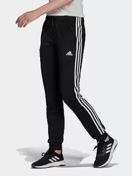 Image of adidas Primegreen Essentials Warm-Up Slim Tapered 3-Stripes Tracksuit Bottoms, Black, Size L, Women