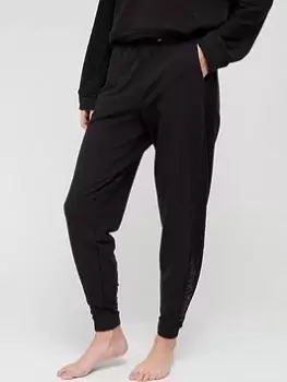 Image of Calvin Klein Mixed Fabric Lounge Jogger &ndash; Black, Size S, Women