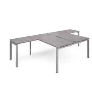 Image of Adapt back to back desks 1600mm x 1600mm with 800mm return desks - silver frame and grey oak top
