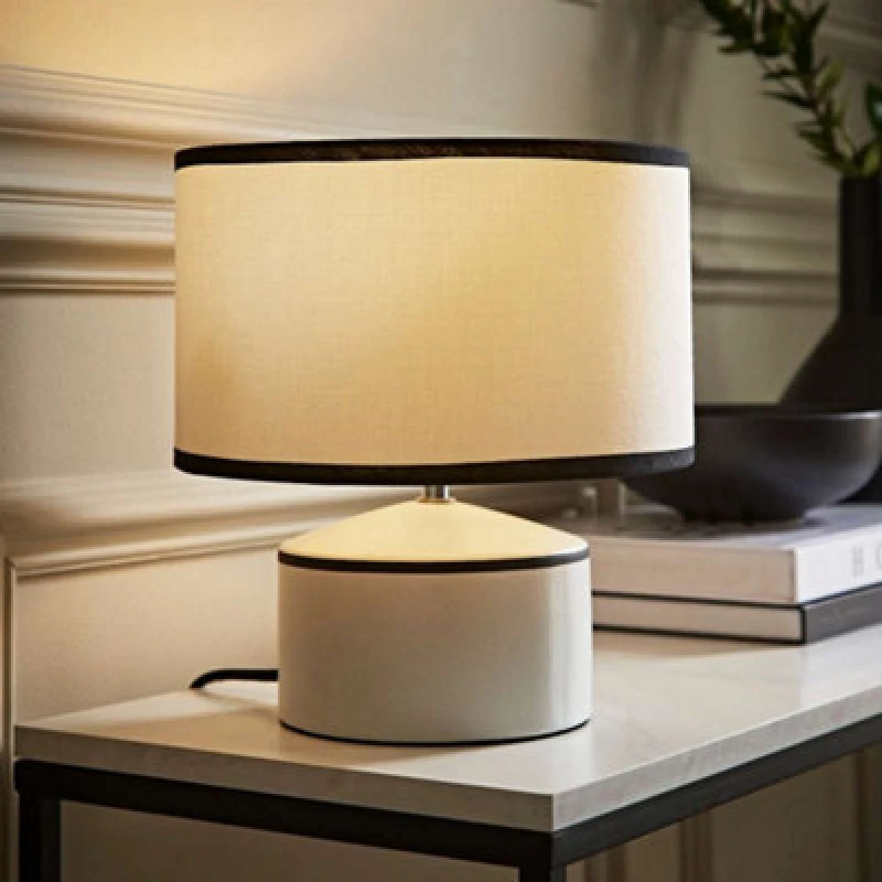 Image of ValueLights ValueLights Julia Black Trim Ceramic Table Lamp with Black Trim Linen Drum Shade in Cream Cream One Size Unisex 5016529273134