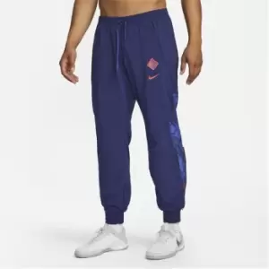 Image of Nike England Woven Pants 2022 2023 Adults - Blue