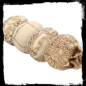 Image of Sinister Smiles Pack Of 4 Skulls