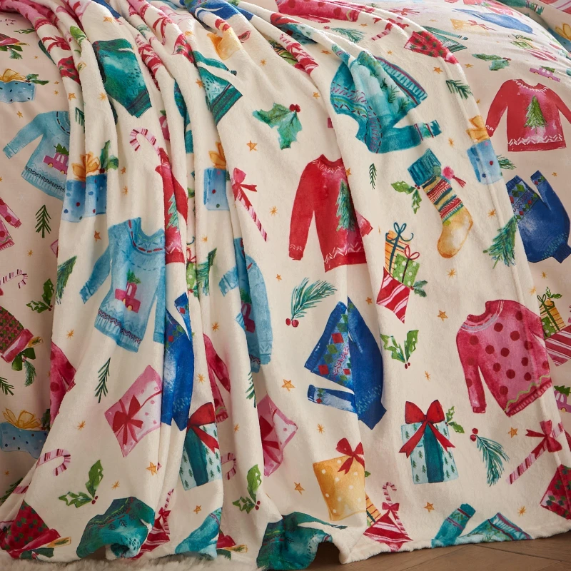Image of Catherine Lansfield Jolly Jumpers Fleece Throw 130cm x 170cm Cream