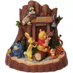 Image of Disney Traditions Winnie the Pooh Carved by Heart Figurine