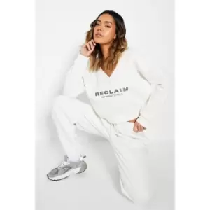 Image of I Saw It First Reclaim Sustainable Staples V Neck Embroidered Crop Sweatshirt - White