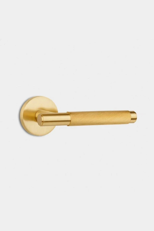 Image of PUSHKA HOME Solid Brass Knurled Door Lever Handle - Gold Gold Unisex