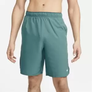 Image of Nike Dri-FIT Challenger Mens 9 Unlined Versatile Shorts - Green