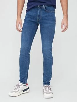 Image of Tommy Hilfiger Bleecker Power Stretch Slim Fit Jeans - Blue, Indigo, Size 34, Length Regular, Men