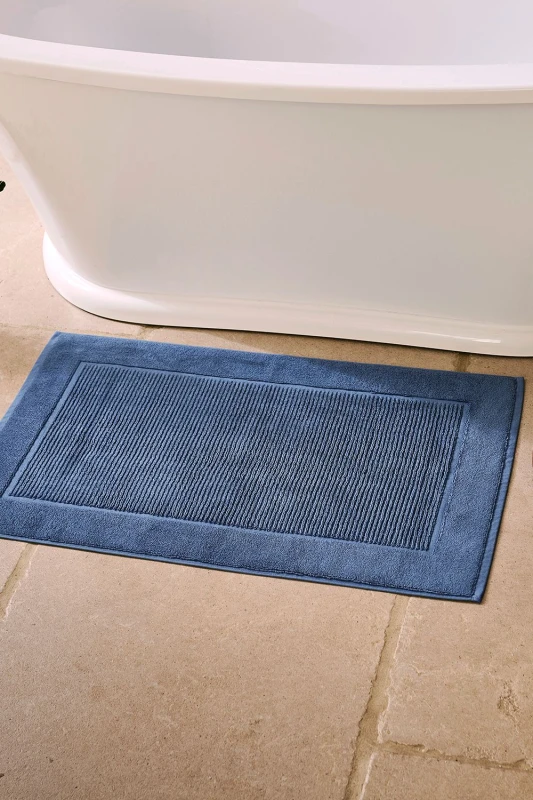 Image of Christy CHRISTY 'Supreme' Luxury 100% Cotton Towelling Bath Mats in Mid Blue Mid Blue One Size Unisex 5012448879945