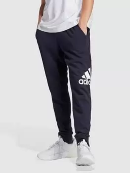 Image of adidas Sportswear Essentials French Terry Tapered Cuff Logo Joggers - Navy, Size XS, Men