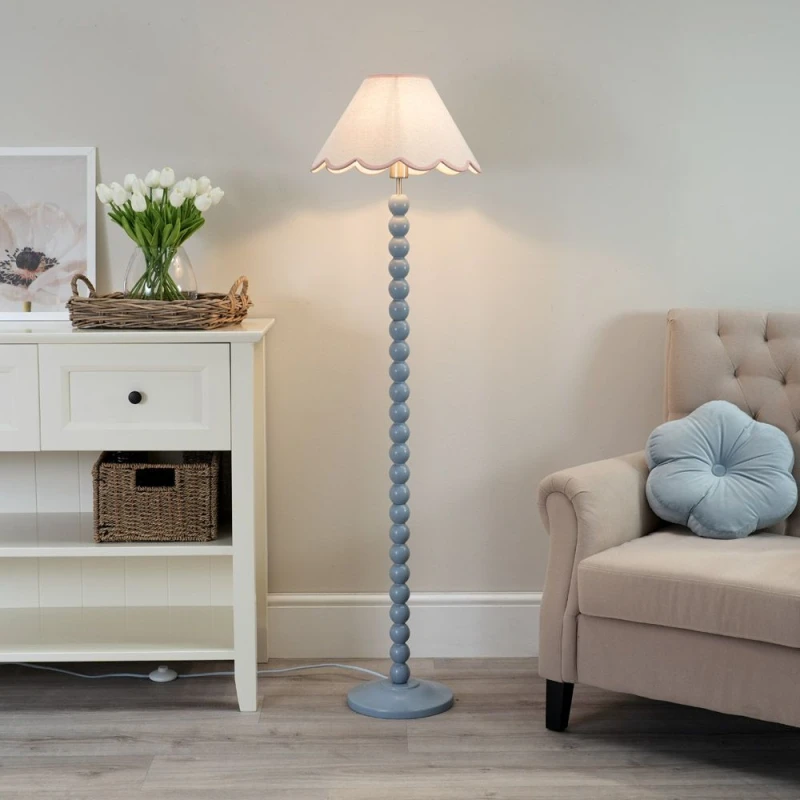 Image of ValueLights Bobbins Powder Blue Floor Lamp with Tapered Natural Linen Scallop Shade Baby Pink