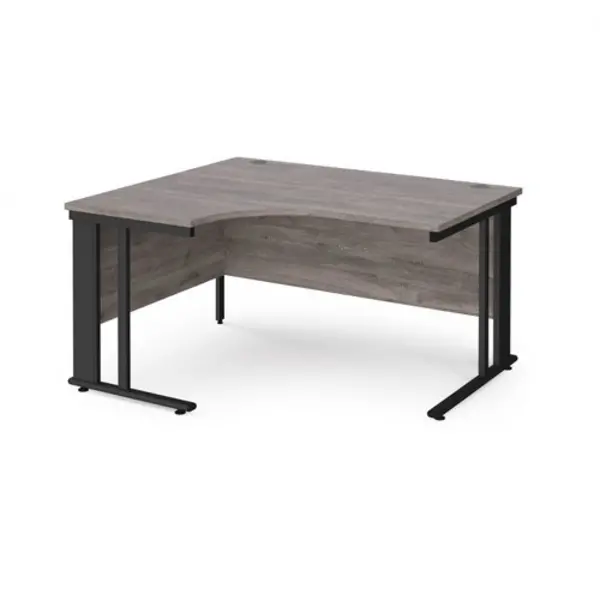 Image of Maestro 25 left hand ergonomic desk 1400mm wide - Black cable managed leg frame, grey oak top