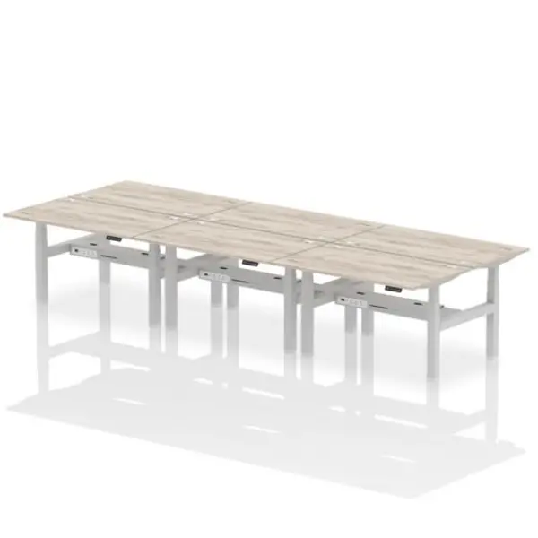 Image of Air Air Back-to-Back 1400 x 800mm Height Adjustable 6 Person Bench Desk Grey Oak Top with Cable Ports Silver Frame HASCP6P14800GRYS