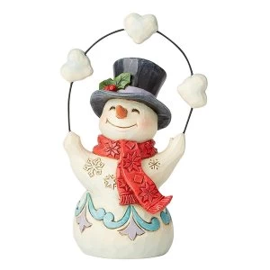 Image of Pint Sized Snowman Juggling Hearts and Snowballs