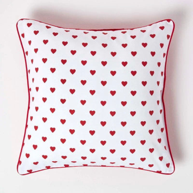Image of HOMESCAPES Homescapes - Cotton Red Hearts Cushion Cover, 60 x 60cm - Red KT1357D