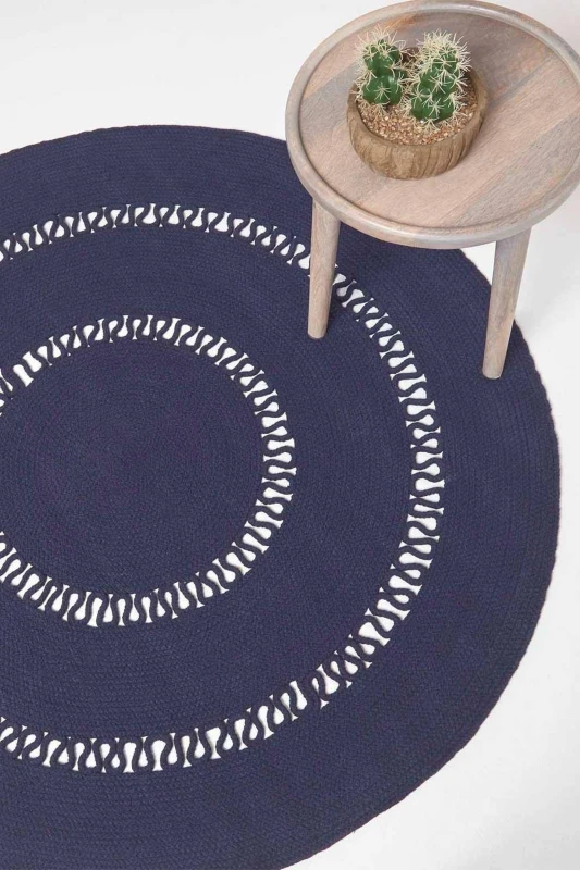 Image of Homescapes Crochet Braided Round Rug in Navy Size: 120cm diameter Navy Unisex 120cm diameter