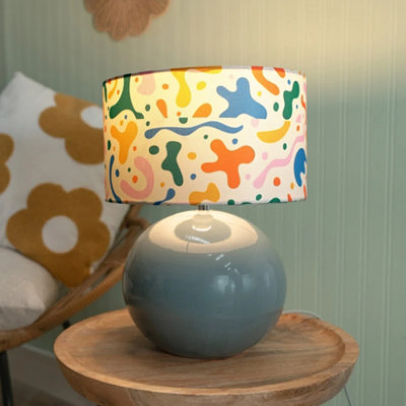Image of ValueLights Bosco Eucalyptus Teal Globe Ceramic Table Lamp with Abstract Shape Lamp Shade Multi