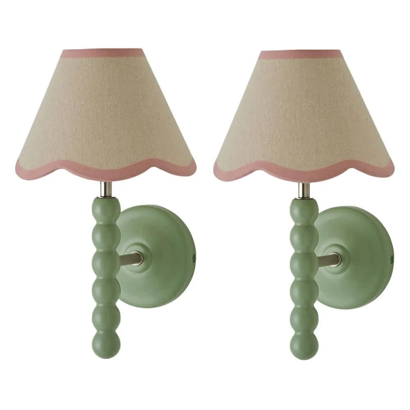 Image of ValueLights Bobbins Pair of Green Wall Lights & Linen Trim Lamp Shades & Bulbs in Pale Pink Pale Pink Unisex