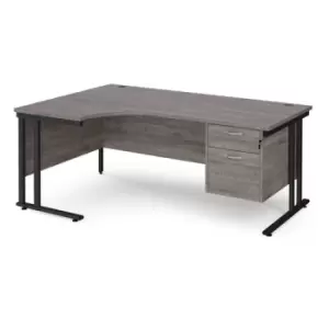 Image of Maestro 25 left hand ergonomic desk 1800mm wide with 2 drawer pedestal - Black cantilever leg frame and grey oak top