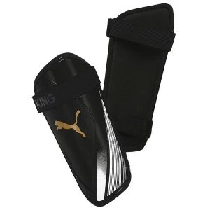 Image of Puma King ES 2 Slip In Guards Black/Gold Medium