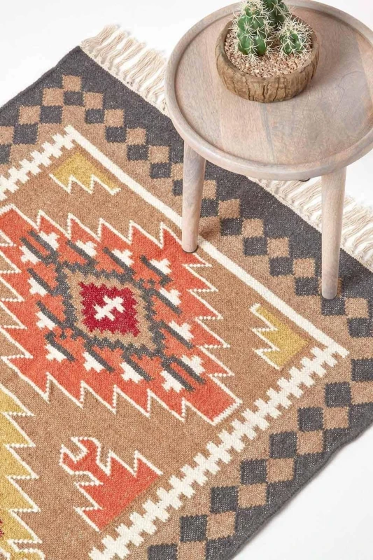 Image of Homescapes Jaipur Handwoven Brown And Orange Patterned Kilim Wool Rug, 90 X 150 Cm