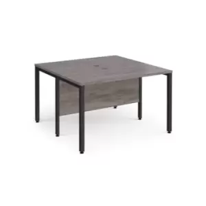 Image of Maestro 25 back to back straight desks 1200mm x 1200mm - Black bench leg frame and grey oak top
