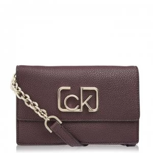 Image of Calvin Klein Cast Flap Over Crossbody - MERLOT BA4