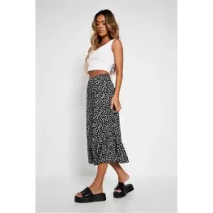 Image of I Saw It First Black & White Polka Dot Dipped Frilled Hem Midi Skirt - Black