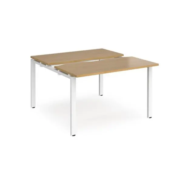 Image of Adapt Bench Desk 2 Person Rectangular Desks 1200mm With Sliding Tops Oak Tops With White Frames 1200mm Depth Adapt Oak STE1212-WH-O