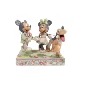 Image of Spring Mickey, Minnie and Pluto Figurine