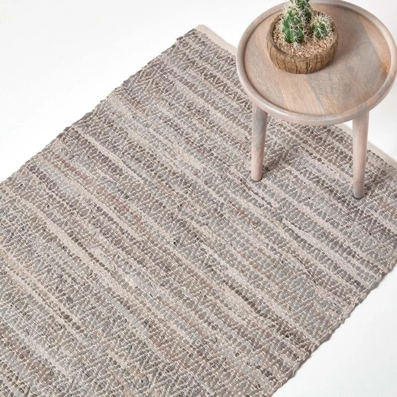 Image of HOMESCAPES Grey Real Leather Handwoven Diamond Pattern Rug, 120 x 180cm - Homescapes RU1324C
