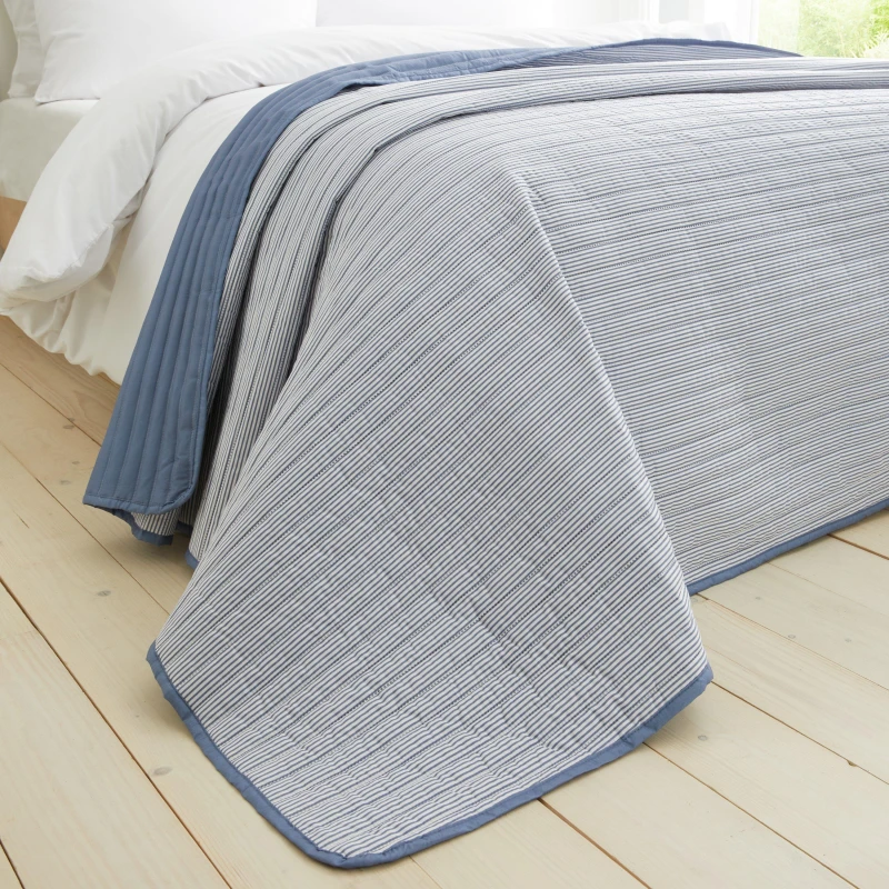 Image of Catherine Lansfield 'Stripe' Quilted Reversible Bedspread Blue