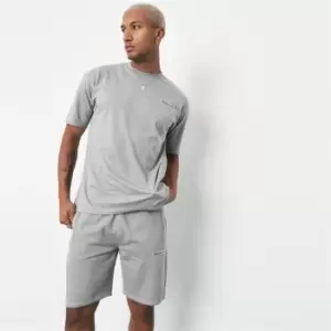 Image of Mennace Badge Oversized T Shirt - Green