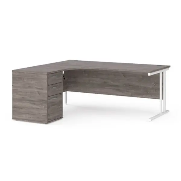 Image of Maestro 25 left hand ergonomic desk 1800mm with white cantilever frame and desk high pedestal - grey oak
