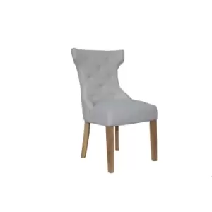 Image of Kettle Interiors Winged Button Back Chair With Metal Ring Natural