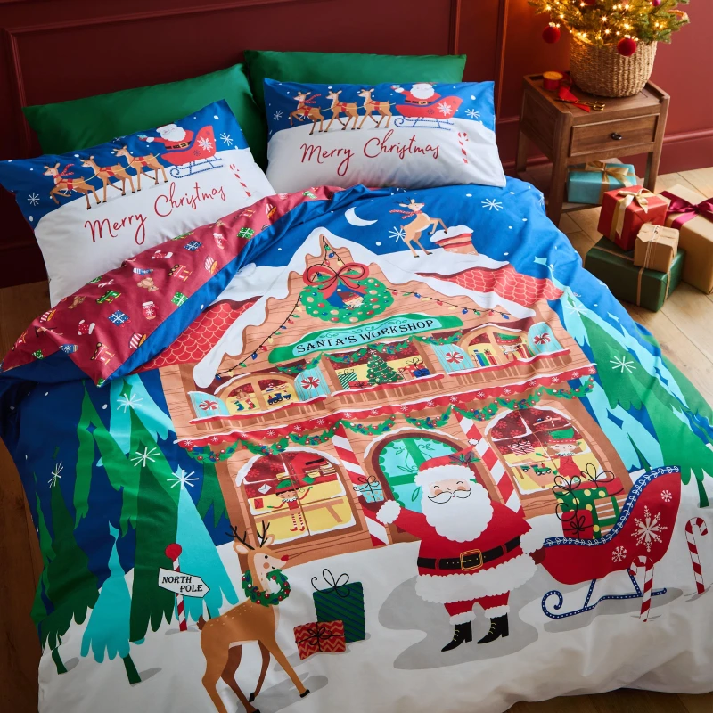 Image of Catherine Lansfield Christmas Santas Workshop Duvet Cover and Pillowcase Set Navy (Blue)