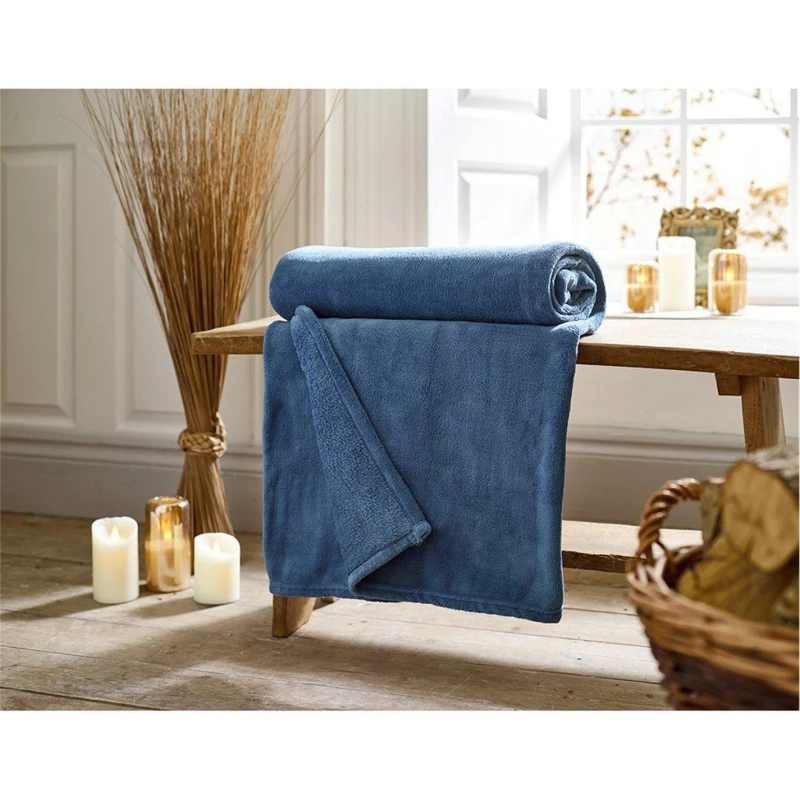 Image of Deyongs Deyongs Snuggle Touch Super Soft Solid Colour Fleece Throw in Mid Blue Size: 140cm x 180cm Mid Blue 140cm x 180cm Unisex 5054990142542