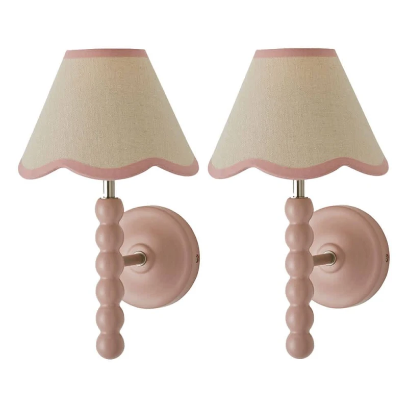 Image of ValueLights Bobbins Pair of Pink Wall Lights with Linen Trim Lamp Shades & Bulbs in Pale Pink Pale Pink Unisex