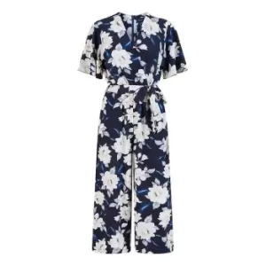 Image of Mela London Navy Floral Jumpsuit With Angel Sleeves - Blue