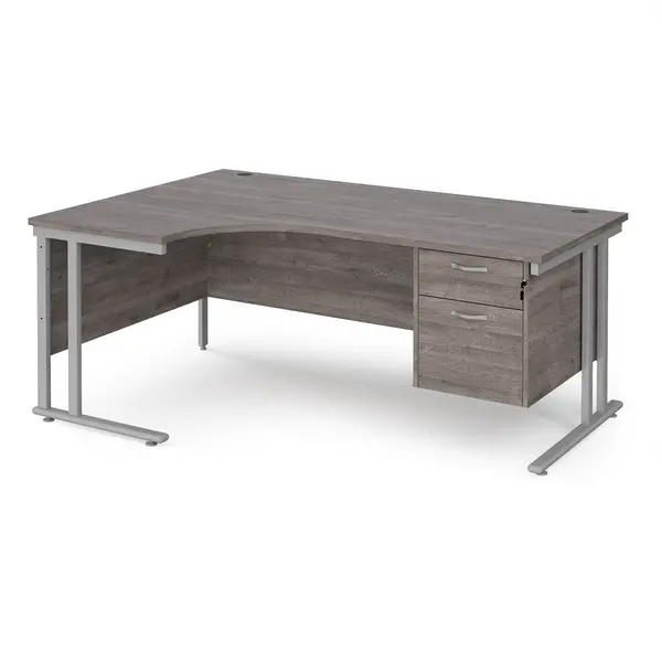 Image of Maestro 25 left hand ergonomic desk 1800mm wide with 2 drawer pedestal - silver cantilever leg frame, grey oak top
