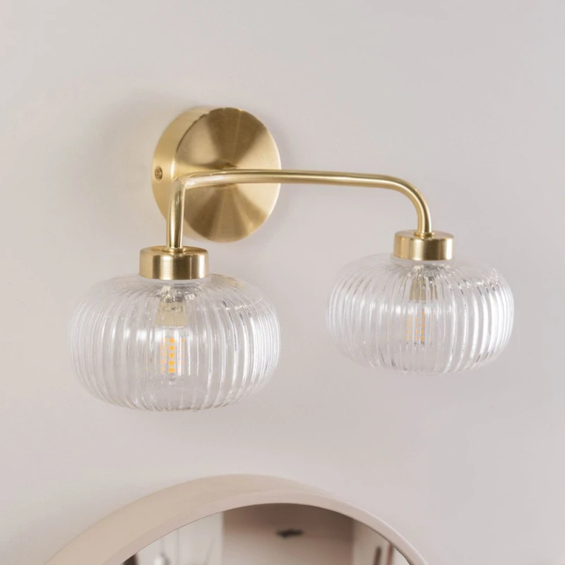 Image of ValueLights Amaia Pair of Brushed Gold IP44 2 Way Clear Glass Wall Lights with LED Bulbs Gold