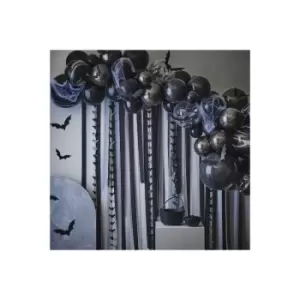 Image of Black and White Balloon Arch with Streamers and Paper Bats