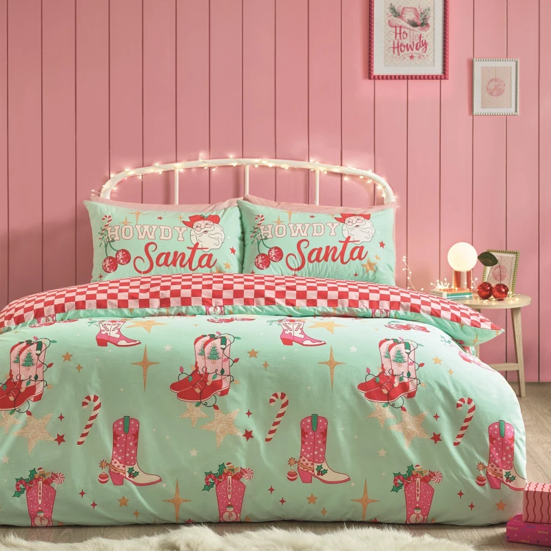 Image of Catherine Lansfield Catherine Lansfield 'Santa's Howdy Christmas' Reversible Duvet Cover Set in Green Size: Double Green Double Unisex 5057681187037