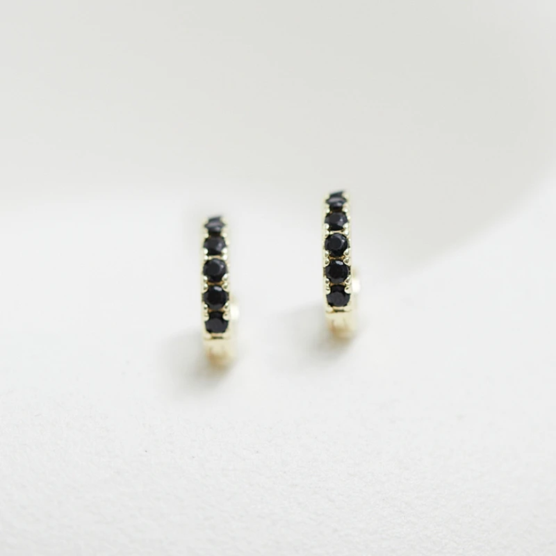 Image of Inicio Gold Plated Jet Huggie Hoop Earrings - Gift Pouch Gold