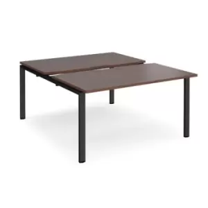 Image of Bench Desk 2 Person Starter Rectangular Desks 1400mm With Sliding Tops Walnut Tops With Black Frames 1600mm Depth Adapt