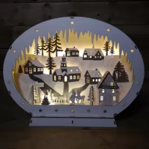 Image of Festive - 45cm Battery Operated Christmas Lit Wooden Oval Winter Village Silhouette