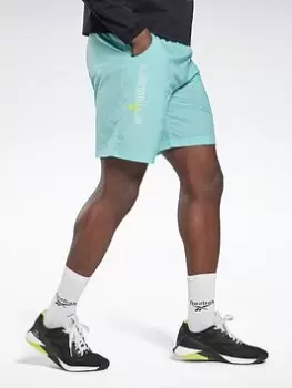 Image of Reebok Les Mills Lightweight Woven Shorts - Blue Size M, Men