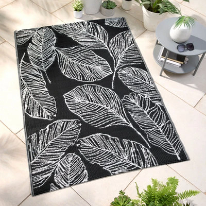Image of Fusion Matteo Leaf Print Uv Resistant Black Outdoor Rug