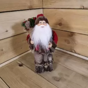 Image of Festive 30cm Tall Standing Woodland Rustic Christmas Santa with Present and Oil Lamp